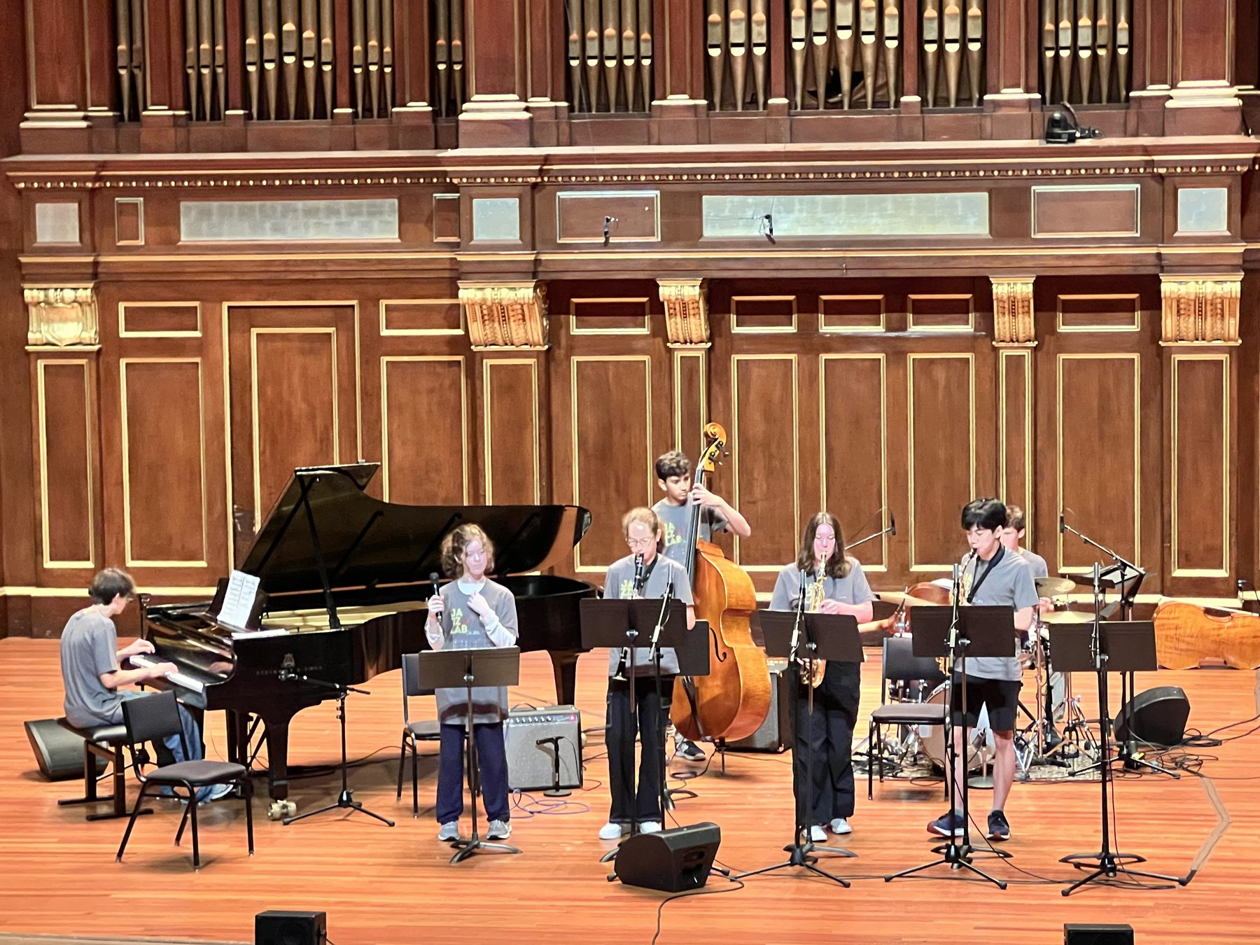 Playing upright bass on stage with Milton's Jazz Band